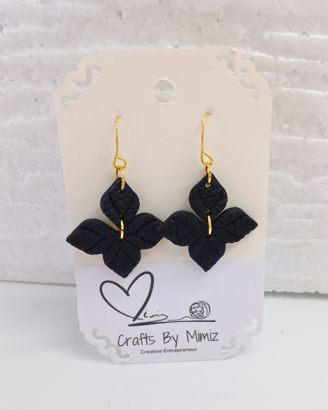 Handmade polymer clay clover earrings in black with gold-filled hooks